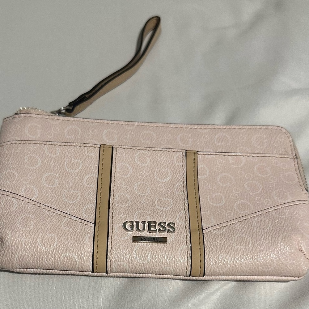 Guess powder pink wristlet.